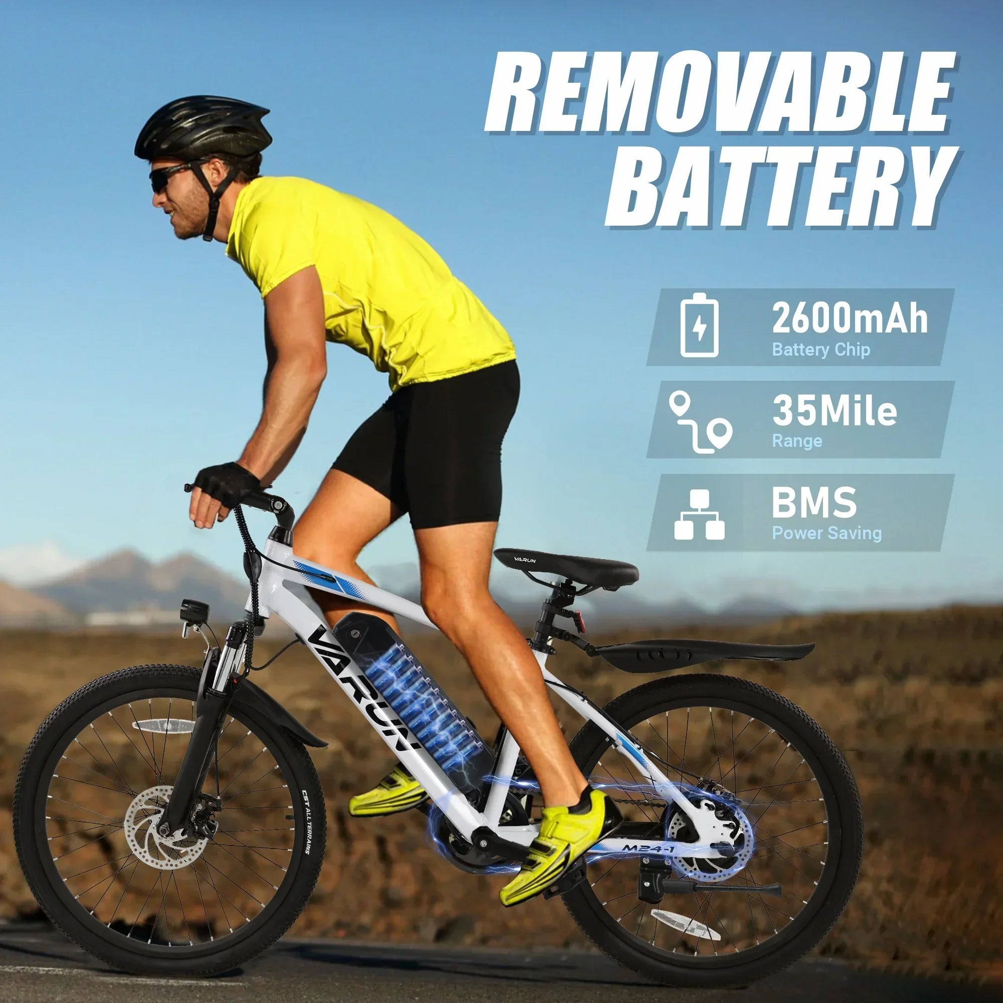 Cyclist wearing yellow and black riding a white VARUN electric mountain bike with removable 2600mAh battery and 35 mile range