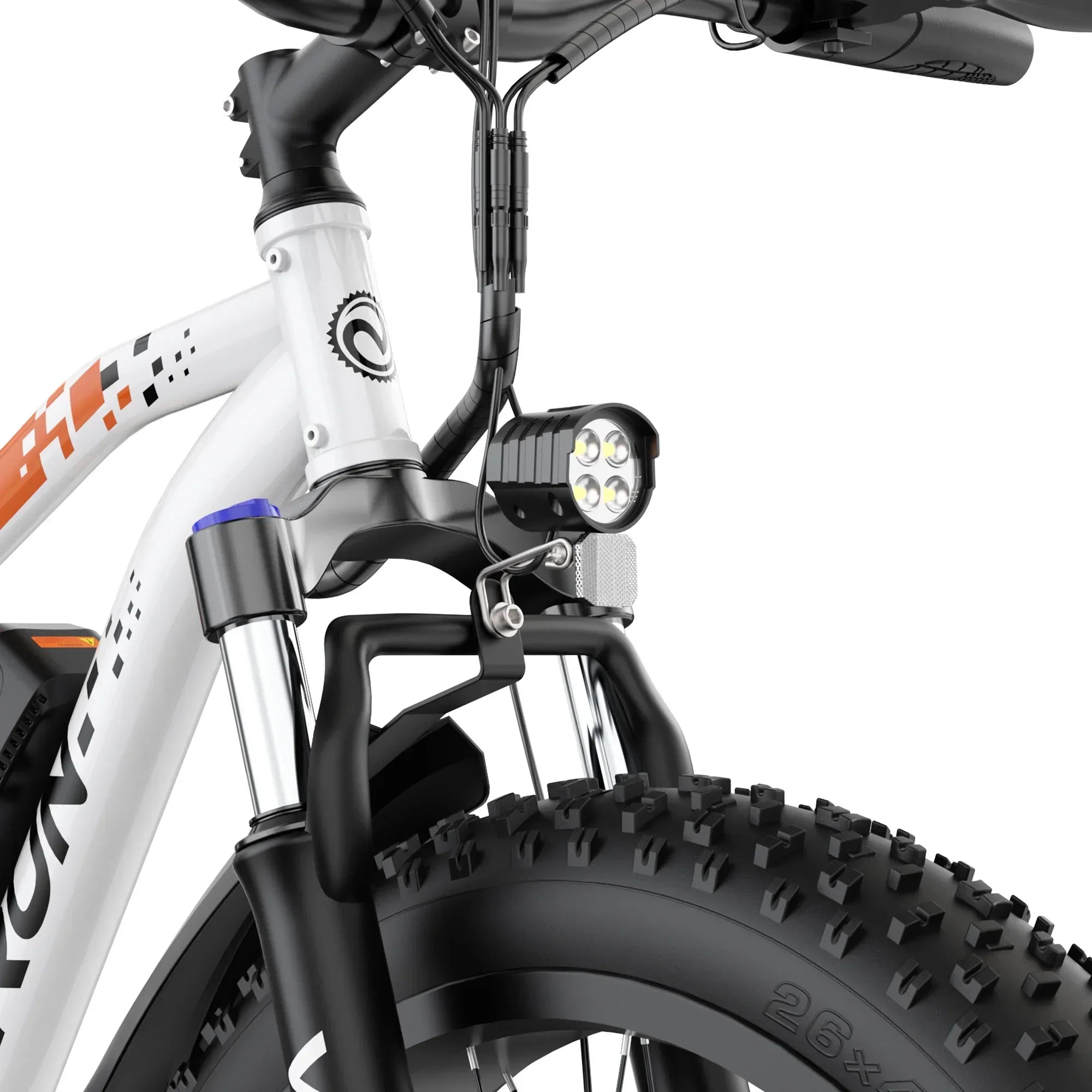 Close-up of white fat tire bike front suspension fork with LED headlight and thick knobby tire