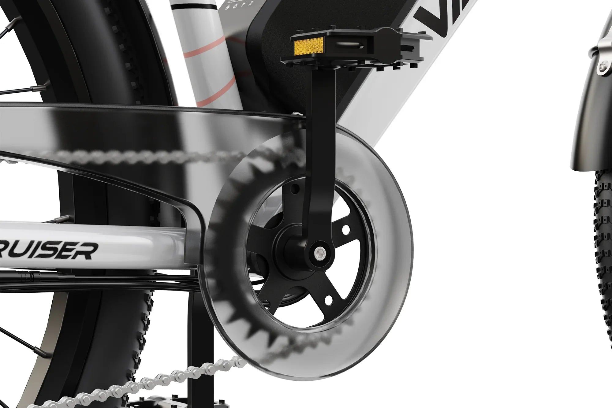 Close-up of white cruiser electric bike drivetrain with transparent chain guard and black pedal