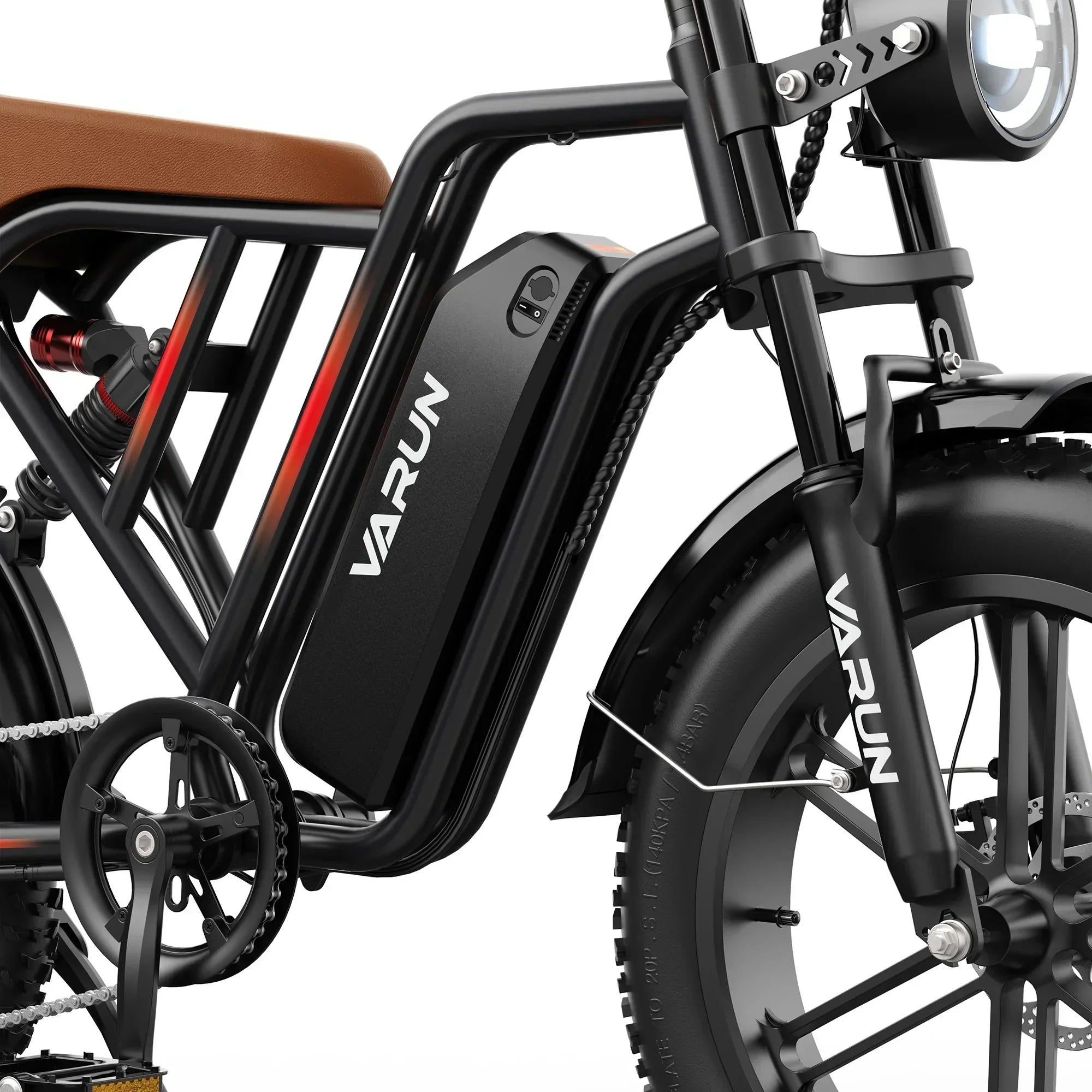 Close-up of black Varun electric mountain bike frame, battery, and front wheel with brown seat