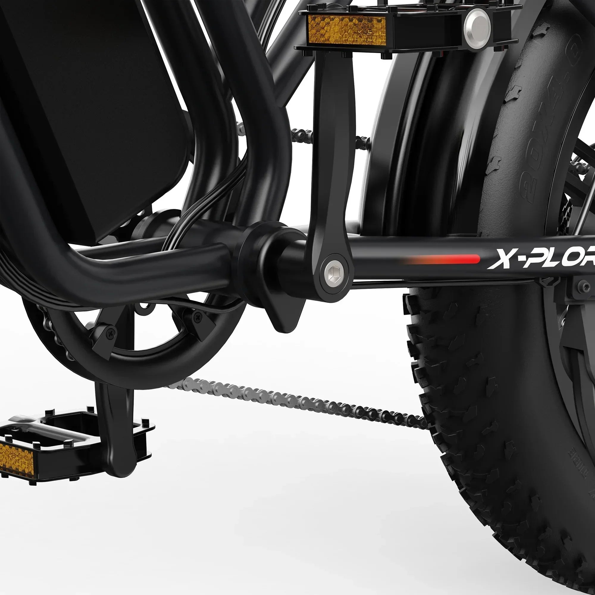 Close-up of black mountain electric bike pedal, chain, and rear tire with X-PLORER branding