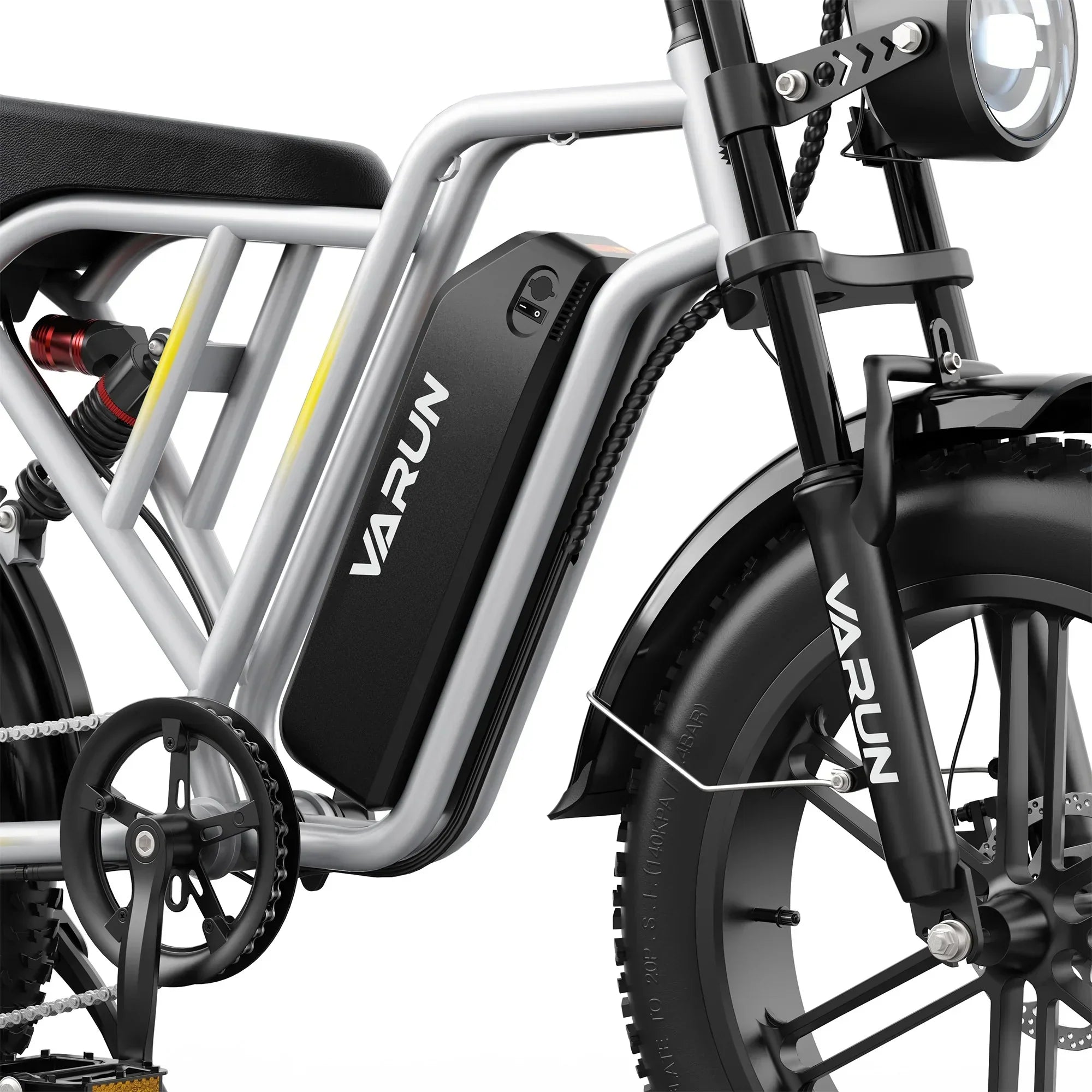 Silver and black VARUN off-road mountain ebike with front headlight and fat tires