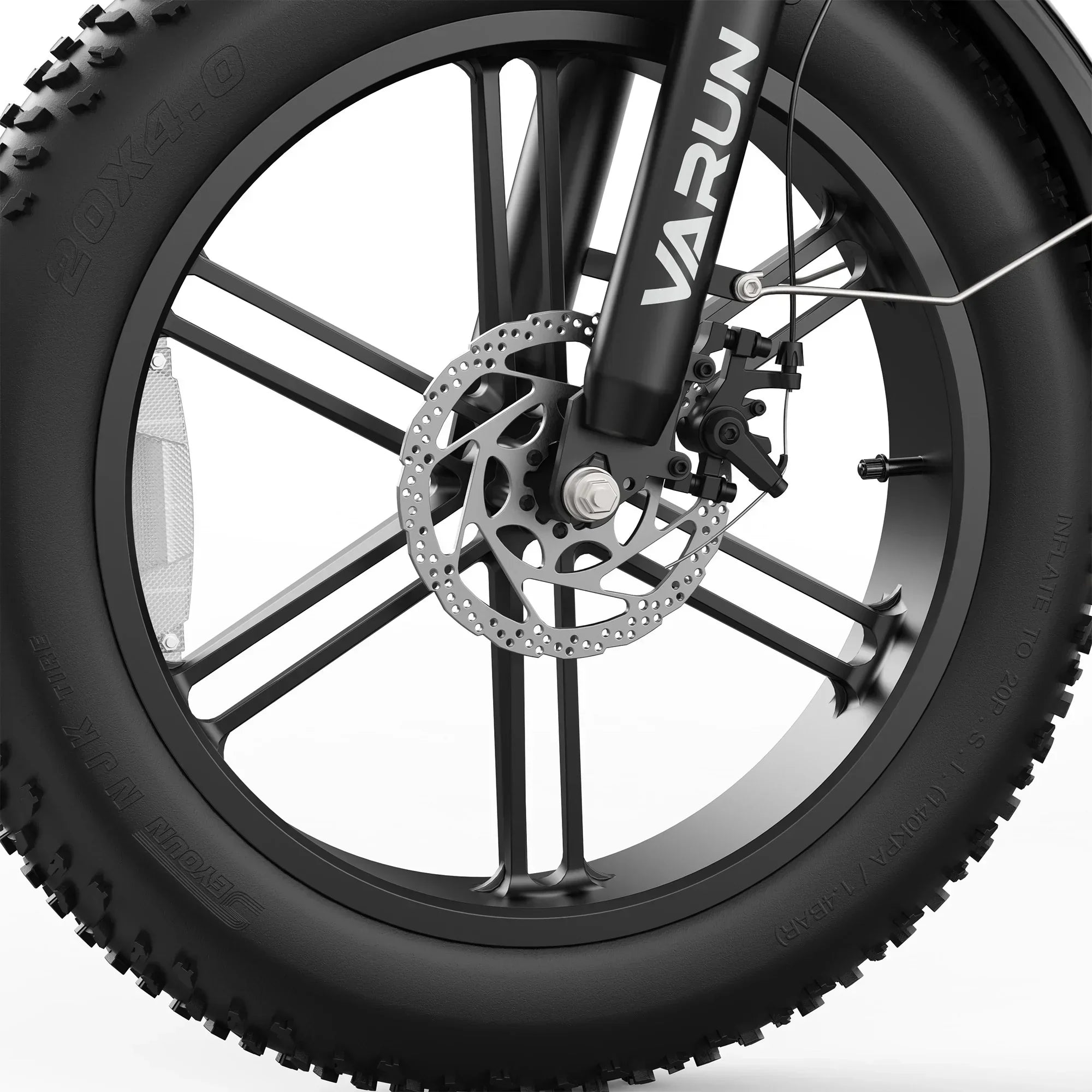 Close-up of VARUN off-road ebike 20x4.0 fat tire with disc brake and black alloy rim
