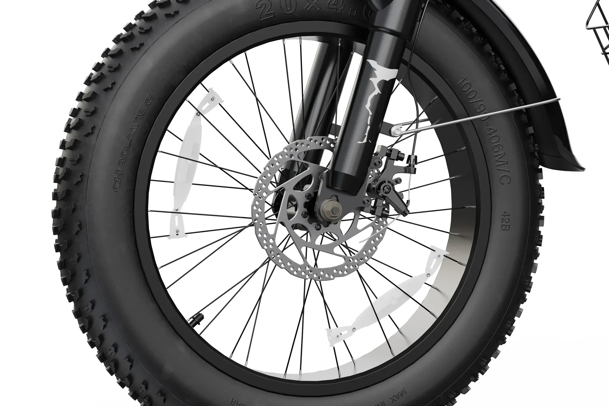 Close-up of black fat tire front wheel with disc brake and spokes on electric bike
