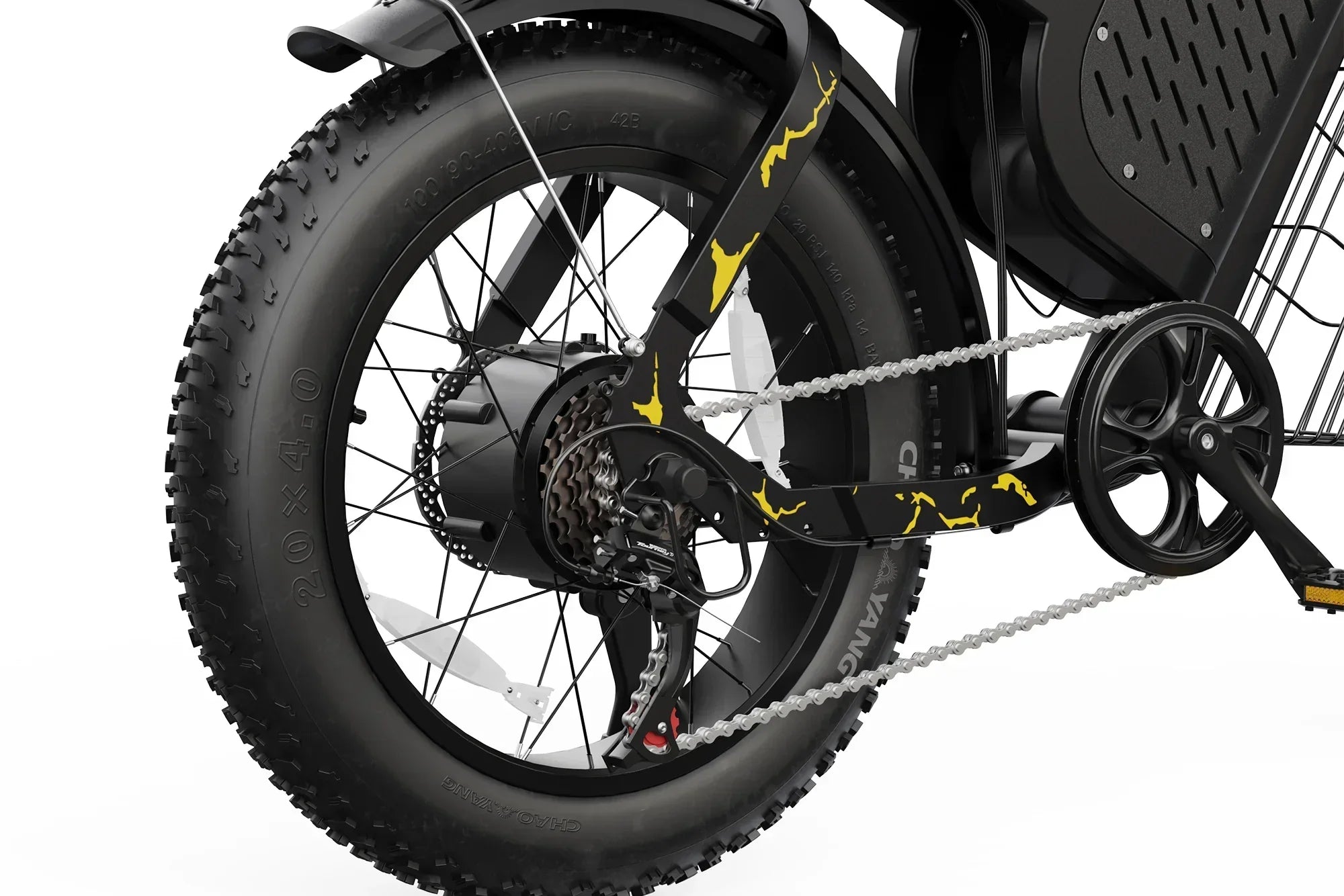 Close-up of fat rear tire and chain of yellow and black electric bike with gear system