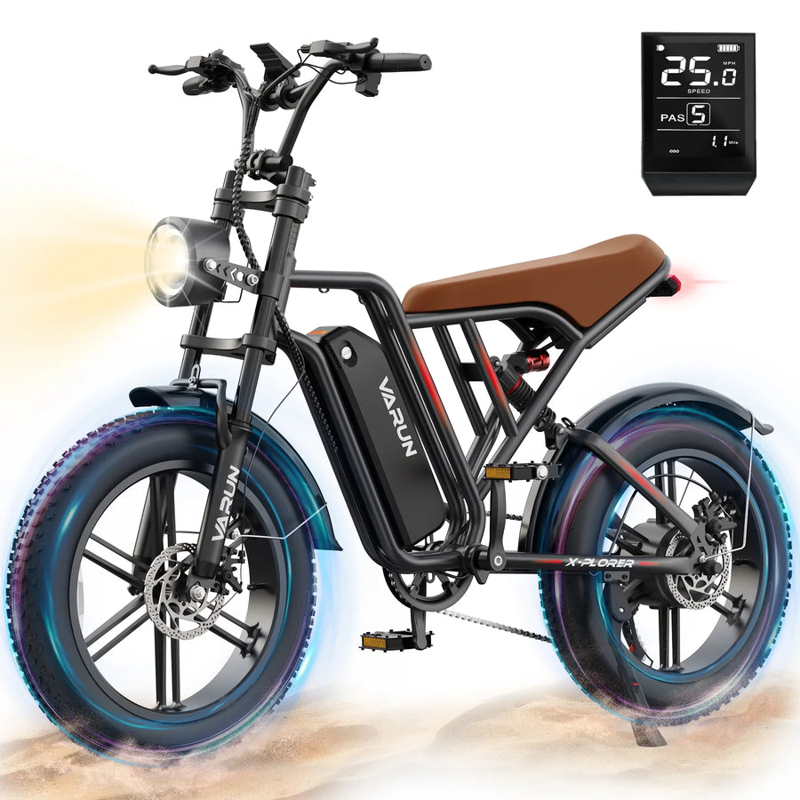 Varun X-Plorer electric bike with brown seat, black frame, front headlight, digital speedometer showing 25 mph