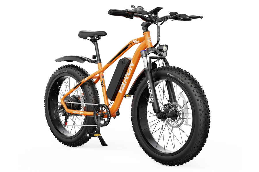 Orange VARUN electric fat tire mountain bike with black battery pack and front suspension