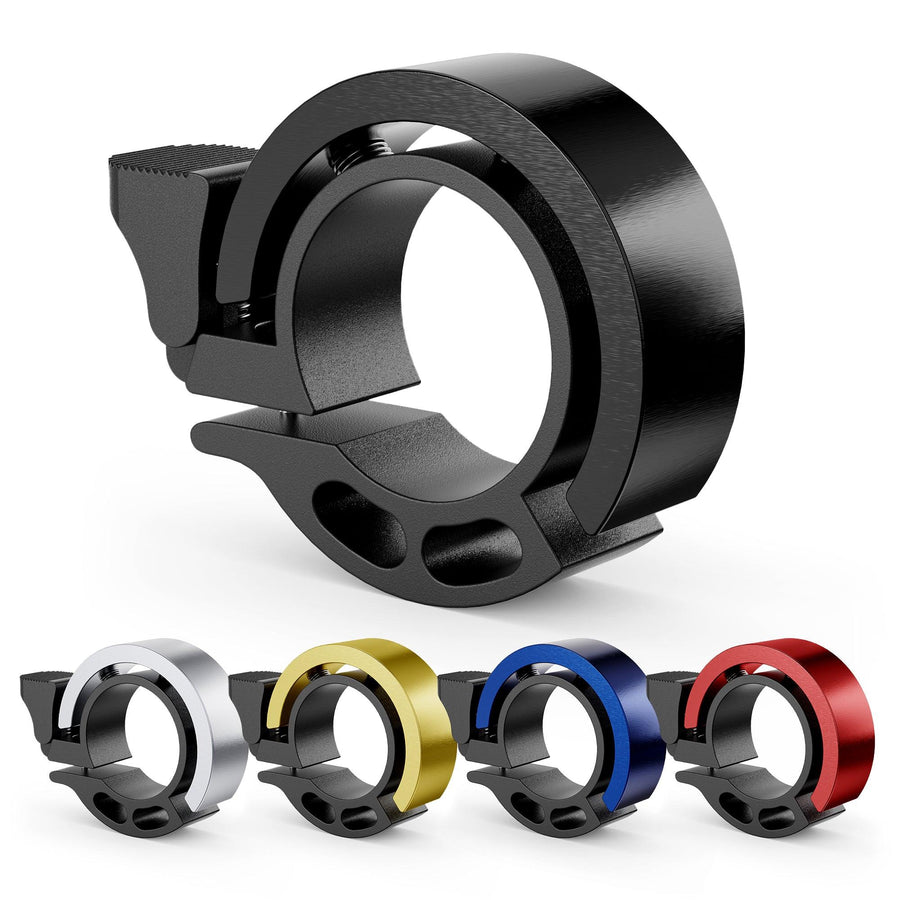 Set of sleek metal bicycle bells in black, silver, gold, blue, and red for handlebars